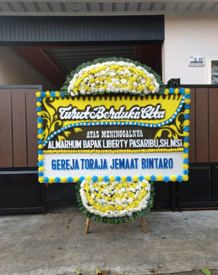 Papan Bunga Duka di Payung Sekaki